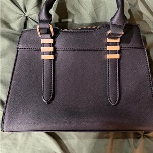 Elegant Black Satchel with Gold Details